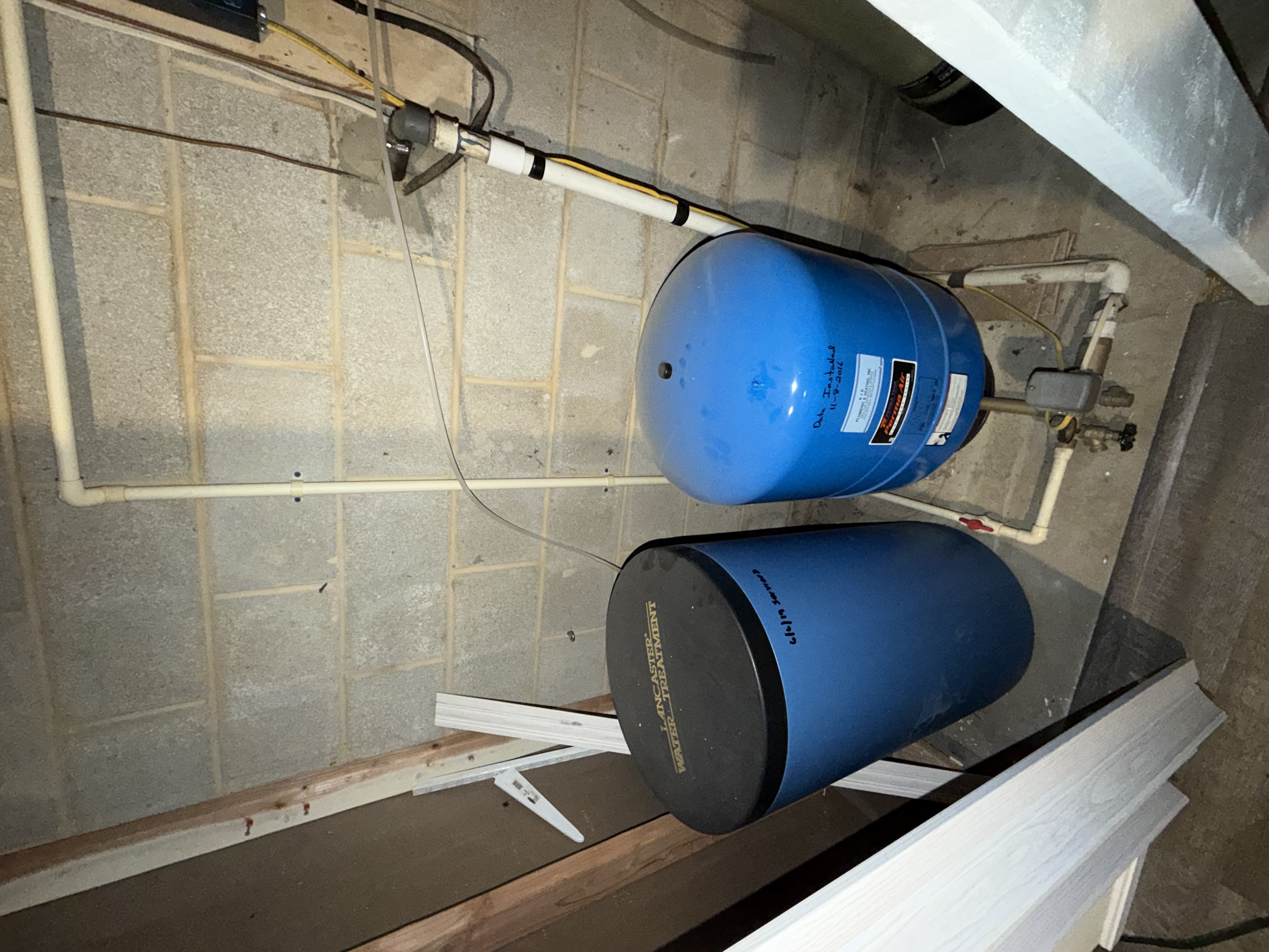 Existing well tank and water treatment system