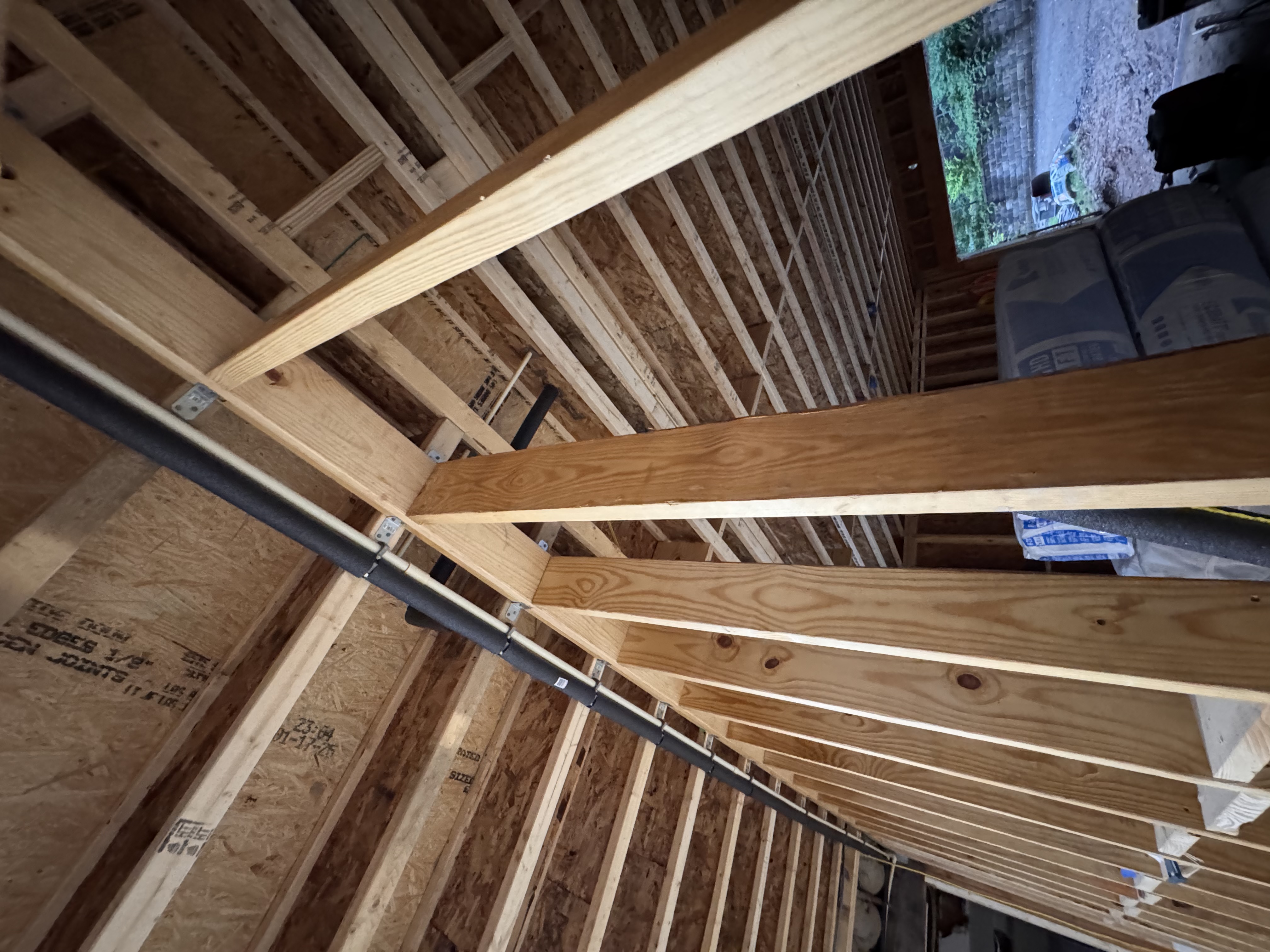 Insulated hot water supply line overhead