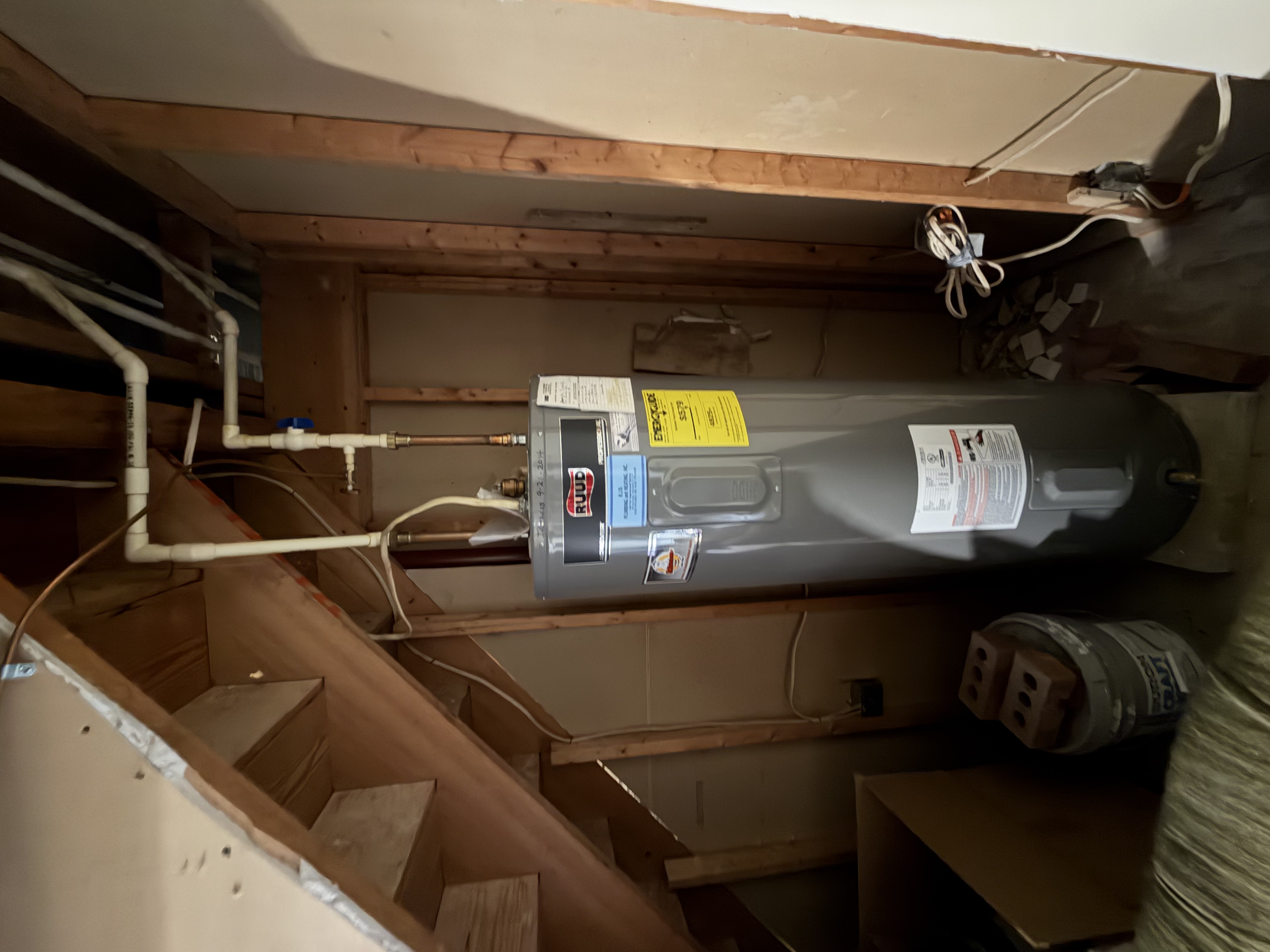 Existing Ruud electric water heater at end of service life